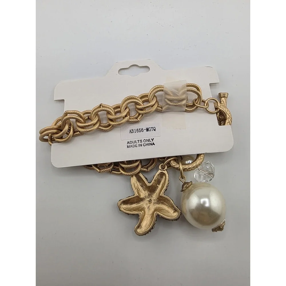 MAKARLON Gold Tone Charm Bracelet Starfish Crystal Pearl Toggle Beach Jewelry